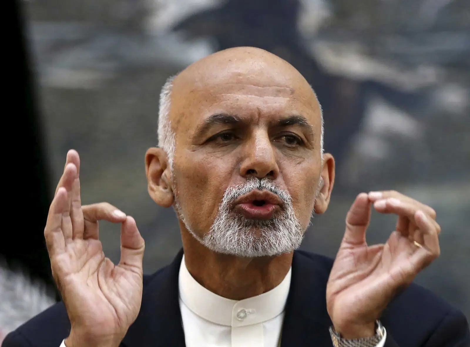 Russian embassy official says President Ghani left with cars, helicopter full of cash